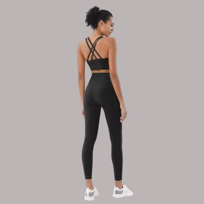 Combinaison sport à jambe évasée en tissu doux Noir | Garage Combinaison sport à jambe évasée en tissu doux Noir | Garage